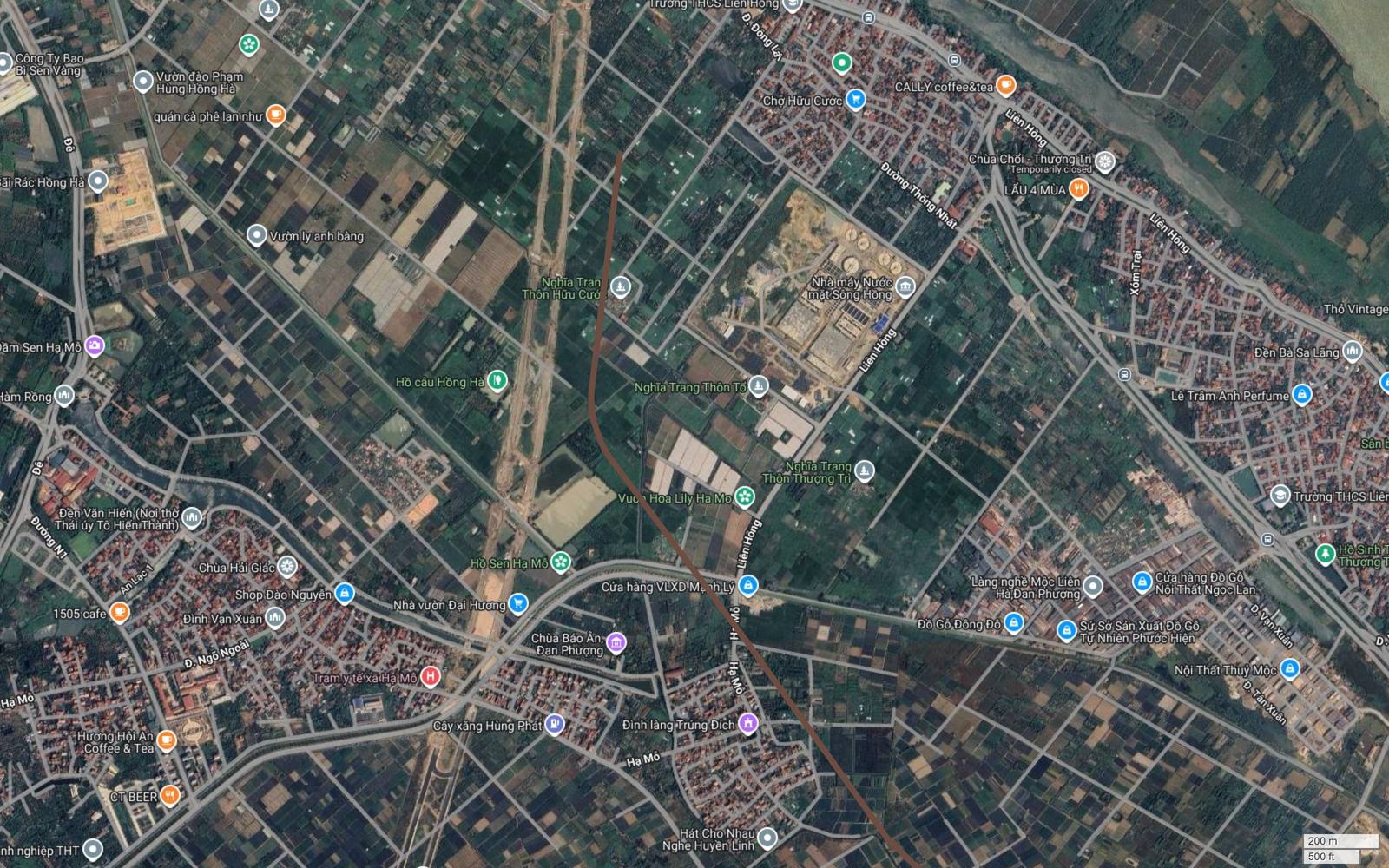 Ảnh vệ tinh đầu tuyến metro số 7 Hà Nội giữa đồng ruộng Liên Hồng và Hữu Cước, Đan Phượng, vạch nâu cắt qua ruộng gần Nhà máy Nước mặt Sông Hồng
